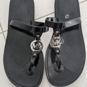Michael Kors flip flops, size 7